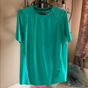 Men’s medium under Armour fitted Casual shirt